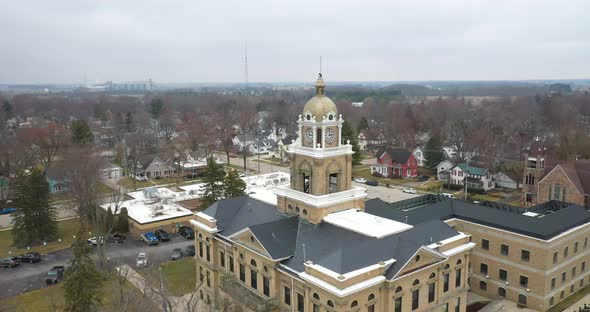 Historical courthouse in Gratiot County, Michigan drone video pulling out. Located in Ithaca, Michig