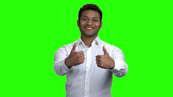 Smiling Indian Man Giving Two Thumbs Up