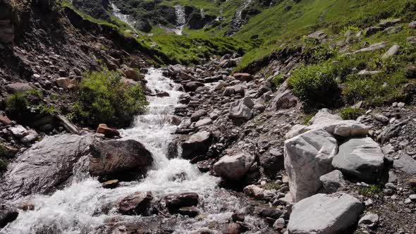 Rocky Stream Flowing Into The Mountain Near Stausee Wasserfallboden In Kaprun, Austria. - aerial