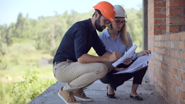 Two Engineer Worjer Hard Hat.Civil Engineer Architect On Construction.Developer On Construction Site