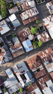 Zanzibar Tanzania  Aerial View of Houses Near the Coast Vertical Video