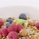 Milk and Muesli Throwing Into the Bowl with Healthy Breakfast - VideoHive Item for Sale