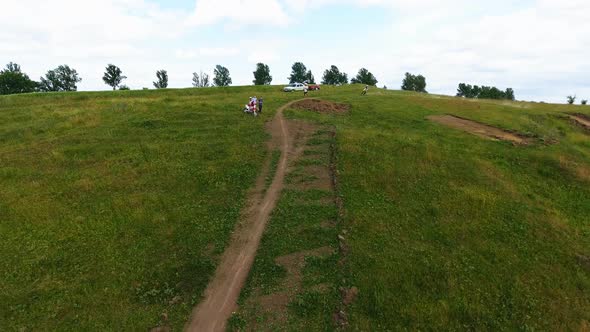 Aerial Top Down View of Motocross Track Showing the High-performance Off-road Motorcycles