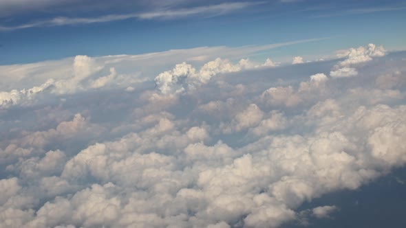 Amazing Skyline View From Airplane Sky Above the Clouds