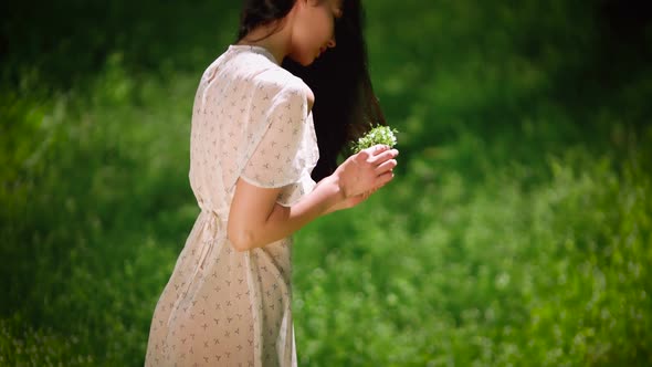 Woman Gathering Flowers