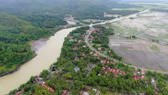 Telomoyo river crossing Kebumen district, Indonesia. Aerial forward