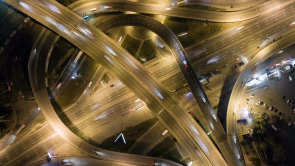 Traffic on Freeway Interchange. Aerial Night View Timelapse City Traffic. FHD, 