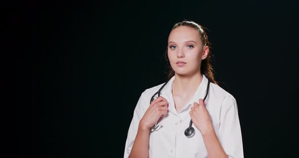 Medical Concept of Young Beautiful Female Doctor in White Coat with Phonendoscope Waist Up Woman