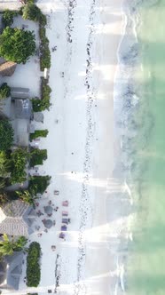 Vertical Video Boats in the Ocean Near the Coast of Zanzibar Tanzania