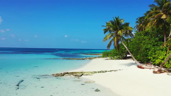 Beautiful above abstract shot of a white sandy paradise beach and blue sea background in best quality