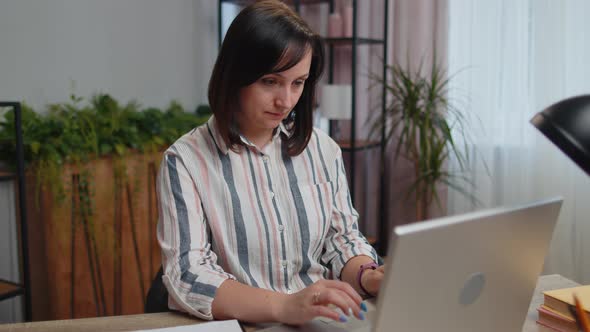 Young Business Woman Works on Laptop Makes Online Purchases Study Elearning Remote Job at Office