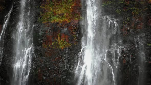 Aerial footage of water fallinf from a cliff, Opaekaa Falls, Kauai, Hawaii, USA