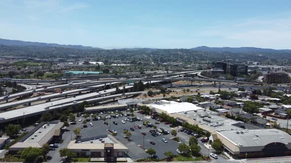 Wide Aerial Drone View Of San Mateo Cityscape, Busy Streets, California, USA