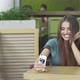 Beautiful Woman Making Selfies on Her Phone at Cafe - VideoHive Item for Sale