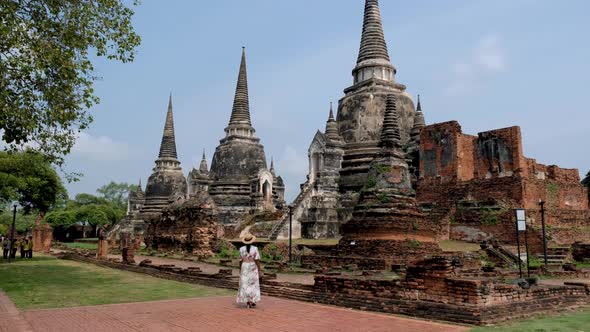 Ayutthaya Thailand at Wat Phra Si Sanphet Women with a Hat and Tourist Map Visiting Ayyuthaya