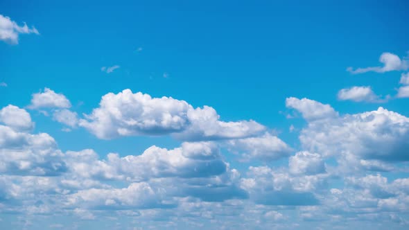 Timelapse of Cumulus Clouds Moving in the Blue Sky