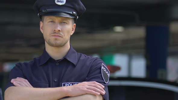 Respectable Policeman in Hat Looking Into Camera, Policing of City Districts