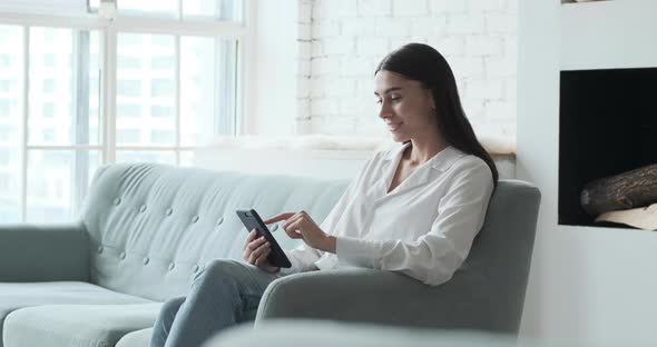 Smiling Young Woman Enjoying Using Smartphone Application Reading Positive News