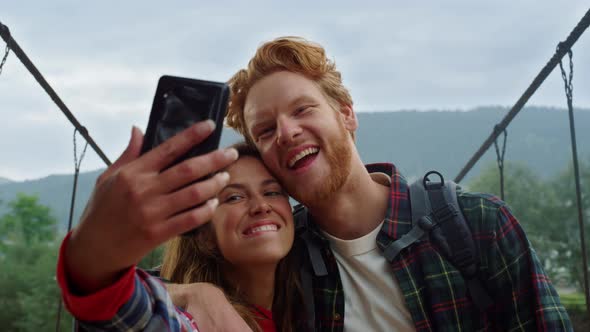 Couple Travelers Taking Selfie in Mountains Nature