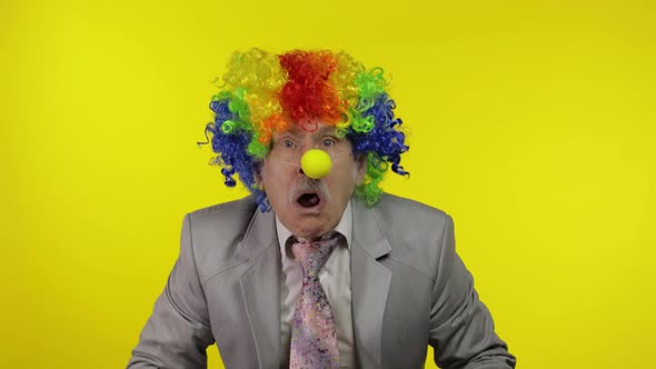 Senior Clown Businessman Entrepreneur Boss Making Silly Faces
