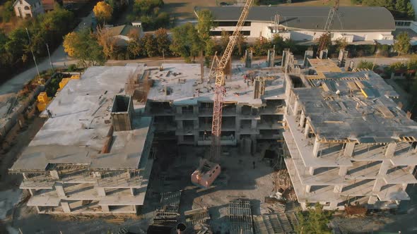Concrete building aerial view, multi-storey esidential complex construction.