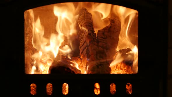 Burning Firewood in the Brick Fireplace