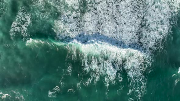 Storm at sea at sunset aerial view 4 K