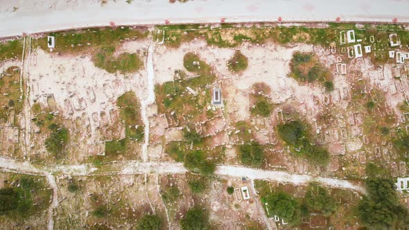 Monuments and tombstones at cemetery. Muslim graveyard alt