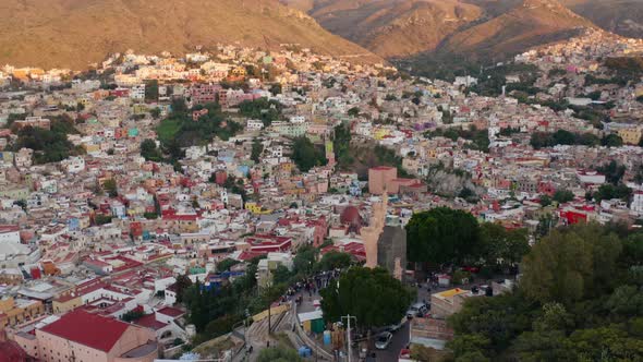 AERIAL: Guanajuato City and The Pipila, Mexico (Tilting Downward)