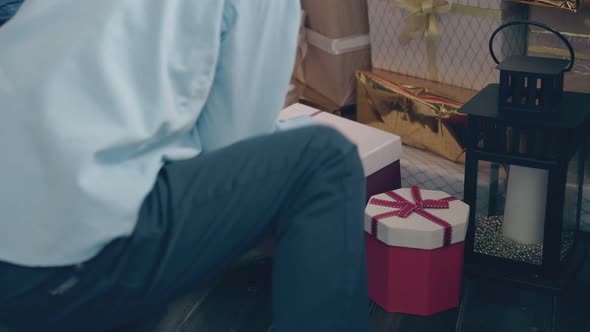 Small Boy Opens Christmas Gift Box and Finds Smartphone