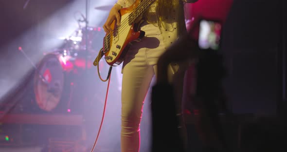 Girl Guitarist at a Live Concert