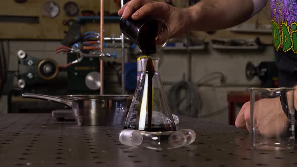 Pour Oil Into A Flask