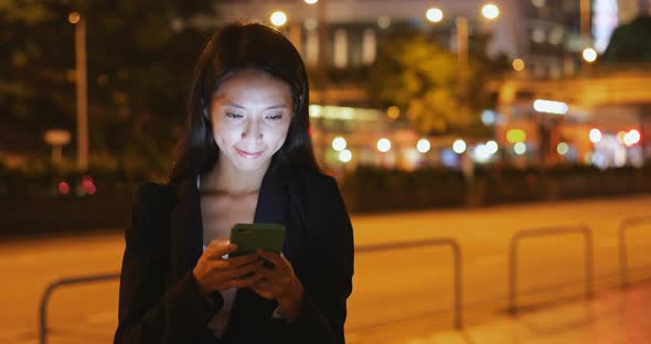 Business woman using tablet at outdoor street 
