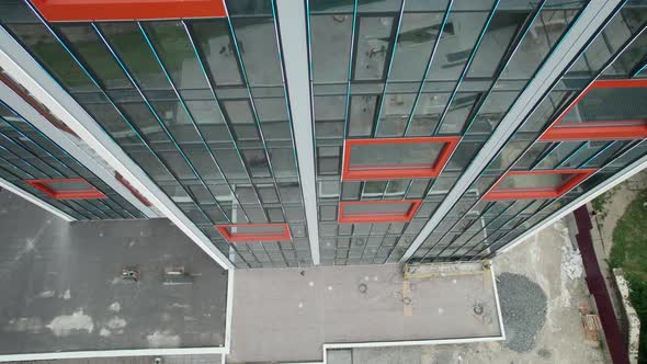 Aerial View of the Exterior of a Modern Hotel Building with Large Windows