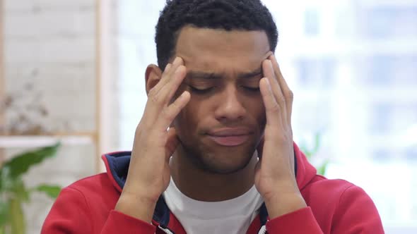 Portrait of AfroAmerican Man Gesturing Failure and Problems