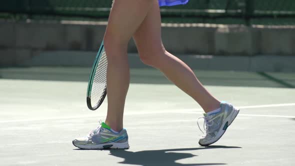 Women playing tennis.