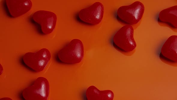 Rotating stock footage shot of Valentines decorations and candies - VALENTINES 0040