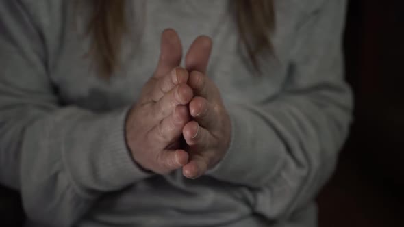 Hands slowly clapping close up shot