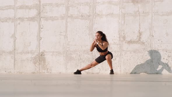 A strong african american woman jumping