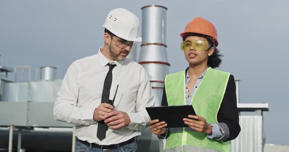 An Architect Man Looks Over Construction