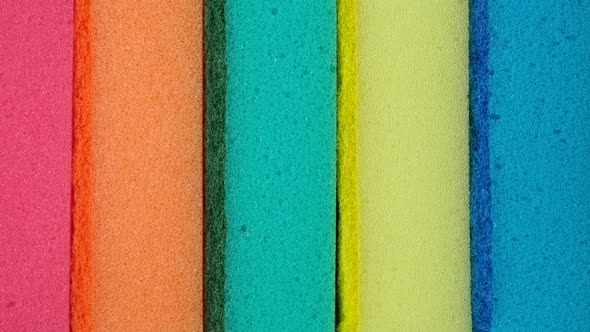 Multi-colored dishwashing sponges close up