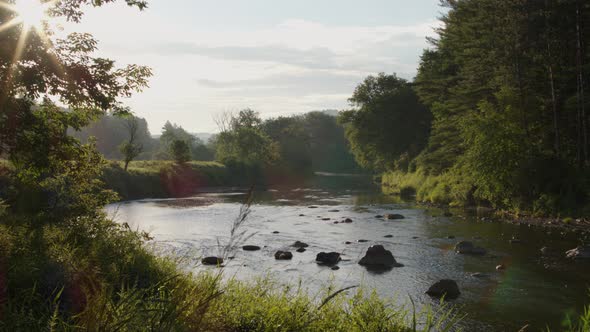 Static shot of river at sunrise