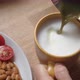 Top View of Pouring Matcha Tea Into Foamed Plant Based Milk. Healthy Vegan Breakfast - VideoHive Item for Sale