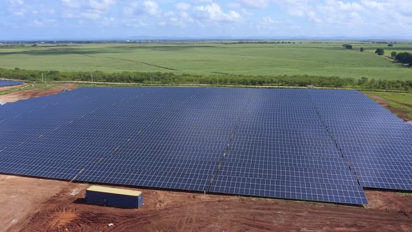 Aerial View Of Clean Energy In Rural Photovoltaic Power Industrial Park - drone shot