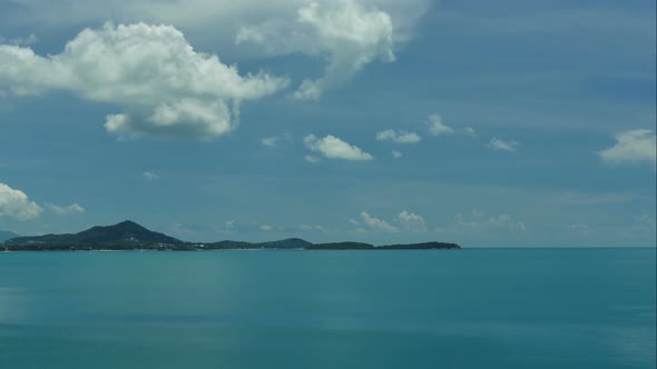 Beautiful tropical beach sea ocean with blue sky and white cloud