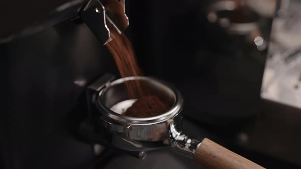 Closeup of Grinding Fresh Coffee Into Pottomless Portafilter