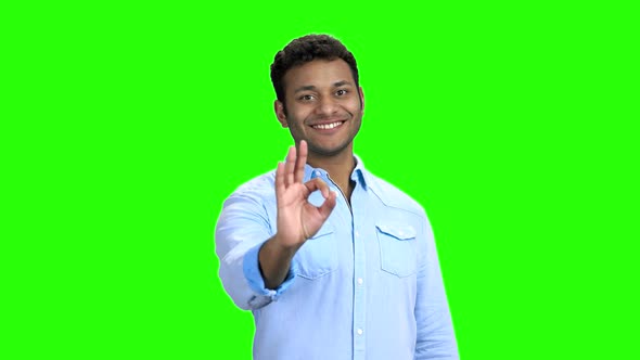 Joyful Businessman Showing Ok Sign with Fingers