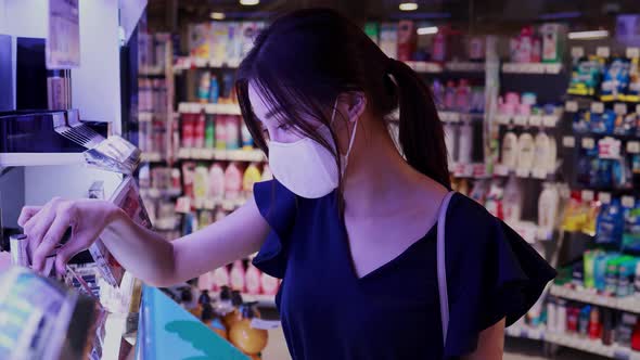 Woman with Mask in Supermarket