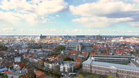 Aerial shot flying up over the ancient city of Leiden, revealing the Faculty of Law of Leiden Univer