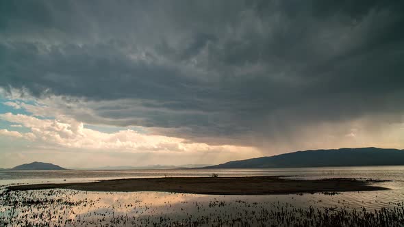 Rain storm moving over Utah Lake in timelapse during summer